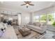 Cozy living room with a view into the kitchen, featuring stylish furniture and plenty of natural light at 1121 Freeman View Dr, Albemarle, NC 28001