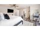 Bright main bedroom with a ceiling fan, ensuite bath, and walk-in closet at 1121 Freeman View Dr, Albemarle, NC 28001