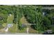 Aerial view of the property, surrounded by lush greenery, showcasing the lot and house location at 1154 Stringfellow Rd, Chester, SC 29706