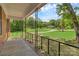 View from covered front porch shows an expansive landscaped front lawn at 1154 Stringfellow Rd, Chester, SC 29706