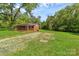 Charming brick home with a spacious front yard and tree-lined surroundings at 1154 Stringfellow Rd, Chester, SC 29706