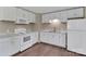 Clean kitchen featuring white appliances and marble-look countertops at 1154 Stringfellow Rd, Chester, SC 29706