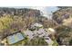 Aerial view featuring tennis courts, community pool, boat access and lake access at 129 Willow Tree Ln, Mount Holly, NC 28120
