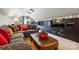 Spacious living room featuring modern entertainment center and comfortable seating area, perfect for relaxing at 129 Willow Tree Ln, Mount Holly, NC 28120