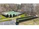 Community pool featuring a well-maintained pool surrounded by lush landscaping at 129 Willow Tree Ln, Mount Holly, NC 28120