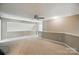 Versatile bonus room with ample space, ideal for a playroom, office, or entertainment area at 14402 Asheton Creek Dr, Charlotte, NC 28273