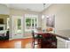 Cozy dining area features a door to the backyard at 14402 Asheton Creek Dr, Charlotte, NC 28273