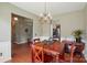 Dining room with hardwood floors and elegant chandelier at 14402 Asheton Creek Dr, Charlotte, NC 28273