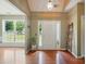 Bright foyer with hardwood floors and views of a green front yard at 14402 Asheton Creek Dr, Charlotte, NC 28273