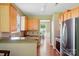Kitchen with stainless steel fridge and view to dining area at 14402 Asheton Creek Dr, Charlotte, NC 28273