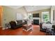 Bright living room featuring a fireplace and hardwood floors at 14402 Asheton Creek Dr, Charlotte, NC 28273