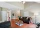 Inviting living room features hardwood floors, a comfortable sofa, and plenty of natural light at 14402 Asheton Creek Dr, Charlotte, NC 28273