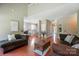 Bright living room showcases hardwood floors, neutral paint, and comfortable seating at 14402 Asheton Creek Dr, Charlotte, NC 28273