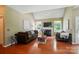 Cozy living room with a fireplace and lots of natural light at 14402 Asheton Creek Dr, Charlotte, NC 28273