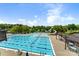 This aerial view showcases the community pool area with its water slide and recreational facilities, perfect for Gathering fun at 14426 Harvington Dr, Huntersville, NC 28078