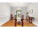 Traditional dining room with hardwood floors, chandelier, and an inviting atmosphere at 14426 Harvington Dr, Huntersville, NC 28078