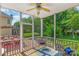 Inviting screened-in porch with comfortable seating, perfect for enjoying the outdoors at 14426 Harvington Dr, Huntersville, NC 28078