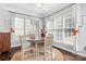 Charming breakfast nook with lots of natural light from the surrounding windows at 16028 Hallaton Dr, Huntersville, NC 28078