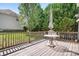 Well-maintained wooden deck with seating, perfect for enjoying the outdoors at 16028 Hallaton Dr, Huntersville, NC 28078