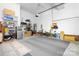 Spacious garage with bikes and storage shelves at 16028 Hallaton Dr, Huntersville, NC 28078