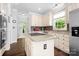 Spacious kitchen with a center island, stainless steel appliances, and ample counter space at 16028 Hallaton Dr, Huntersville, NC 28078
