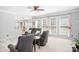 Spacious living room with neutral carpet, gray furniture and multiple windows at 16028 Hallaton Dr, Huntersville, NC 28078