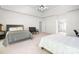 Large main bedroom with carpet, multiple beds and windows at 16028 Hallaton Dr, Huntersville, NC 28078