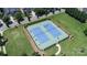 Aerial view of neighborhood tennis courts and surrounding landscaping at 16028 Hallaton Dr, Huntersville, NC 28078
