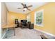 This spacious bedroom features a ceiling fan, carpet and two windows with natural light at 1687 Windy Hill Ln, Great Falls, SC 29055