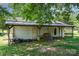 Detached garage with multiple bays, offering plenty of storage and workspace at 1687 Windy Hill Ln, Great Falls, SC 29055