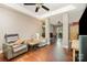 Spacious living room with hardwood floors, neutral walls, and a ceiling fan at 1687 Windy Hill Ln, Great Falls, SC 29055