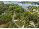 Scenic aerial view of a lakeside community with lush greenery and stunning water views at 19614 Meta Rd, Cornelius, NC 28031