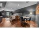 Spacious bonus room with hardwood floors, recessed lighting, and ample seating at 19614 Meta Rd, Cornelius, NC 28031