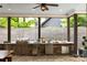 Outdoor kitchen with a built-in grill and stainless steel appliances, perfect for entertaining and outdoor cooking at 19614 Meta Rd, Cornelius, NC 28031