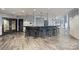 Stylish bar area featuring a countertop, pendant lighting, and seating for entertaining or socializing at 210 N Church St # 2613, Charlotte, NC 28202