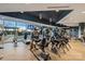 Bright gym featuring modern exercise equipment and large windows offering natural light and views at 210 N Church St # 2613, Charlotte, NC 28202