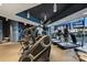 Bright gym featuring modern exercise equipment and large windows offering natural light and views at 210 N Church St # 2613, Charlotte, NC 28202