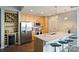 Bright kitchen features stainless appliances, quartz countertops and wine storage at 210 N Church St # 2613, Charlotte, NC 28202