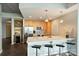 Bright kitchen features stainless appliances, quartz countertops and wine storage at 210 N Church St # 2613, Charlotte, NC 28202