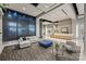 Stylish lobby area with modern furnishings, waterfall wall, and concierge desk at 210 N Church St # 2613, Charlotte, NC 28202