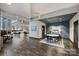 Spacious lobby featuring modern tables and chairs and stylish decor for residents and guests at 210 N Church St # 2613, Charlotte, NC 28202