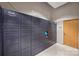 Secure Amazon Hub package locker system for convenient and safe deliveries in the mail room at 210 N Church St # 2613, Charlotte, NC 28202