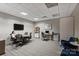 Well-lit study featuring comfortable seating, desks, and bookcases for work or research at 210 N Church St # 2613, Charlotte, NC 28202