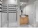 Modern bathroom featuring a glass-enclosed shower, sleek fixtures, and a stylish vanity at 2125 Southend Dr # 448, Charlotte, NC 28203