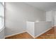 Bright loft space with hardwood floors providing versatile area for a home office or den at 2125 Southend Dr # 448, Charlotte, NC 28203