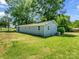 This charming home includes a spacious backyard and lovely landscaping with mature trees at 2313 Eleanor Dr, Shelby, NC 28150