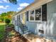 Charming home featuring a welcoming entrance, fresh landscape, and a bright yellow door at 2313 Eleanor Dr, Shelby, NC 28150