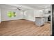 Spacious living room features wood-look floors and windows looking out onto the front yard at 2313 Eleanor Dr, Shelby, NC 28150