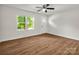 Bright and airy living room with wood-look floors and a welcoming front door at 2313 Eleanor Dr, Shelby, NC 28150