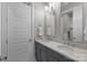 Modern bathroom with double sinks, marble countertops, and chrome fixtures at 2925 Westfield Rd, Charlotte, NC 28209